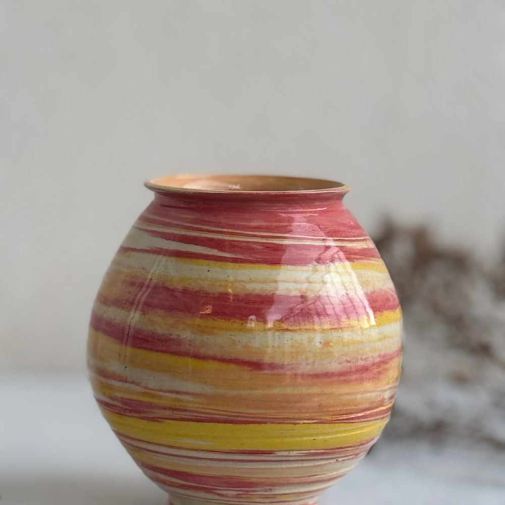 Marigold Swirl Vase viewed from a slight angle