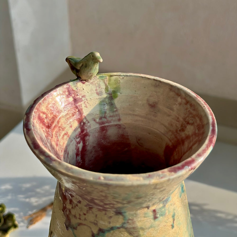 Songbird Perch Vase, front view with the bird figure on the rim