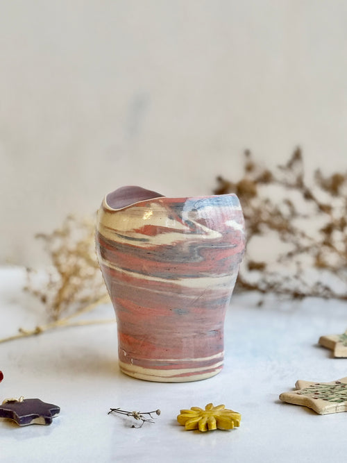 Clay Ribbon Tumbler, front view showing the asymmetric rim