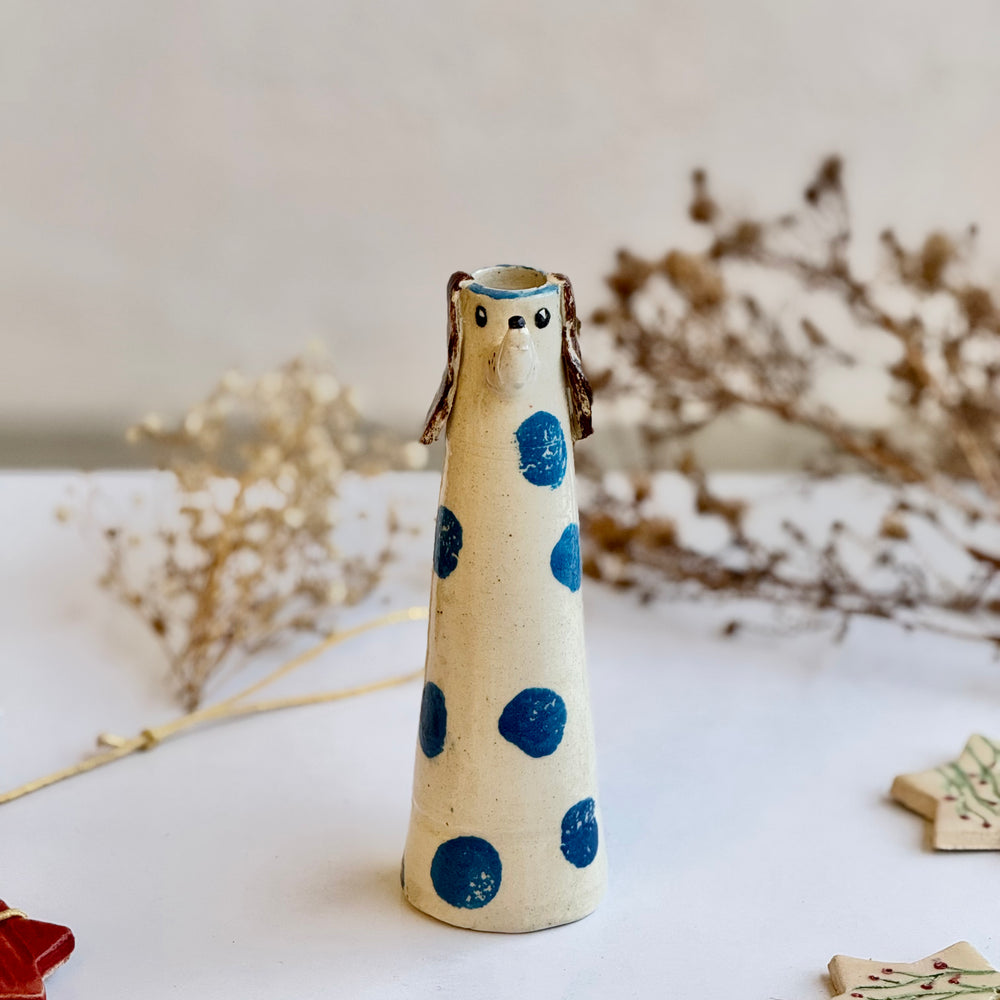 Blueberry Dot Dog viewed from a slight angle