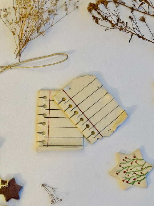 Dog-Eared Page Ornaments, the pair shown together