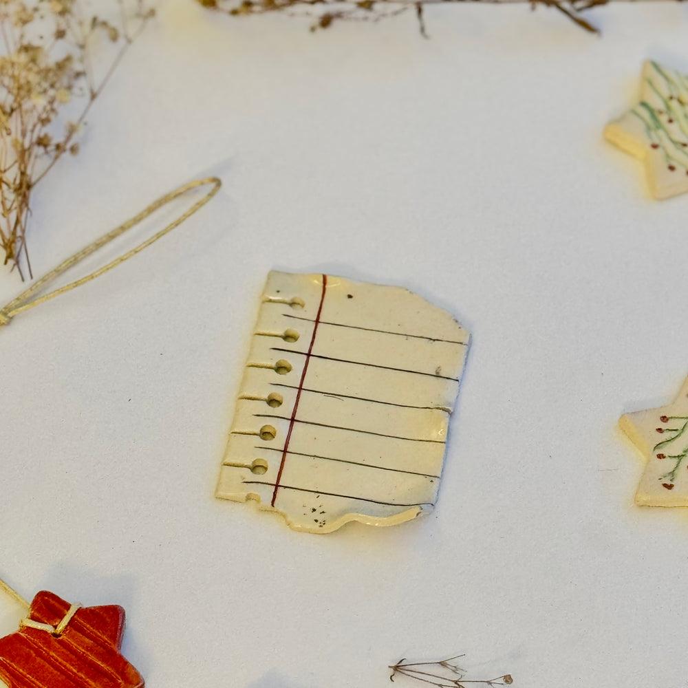 Dog-Eared Page Ornaments, one ornament shown alone