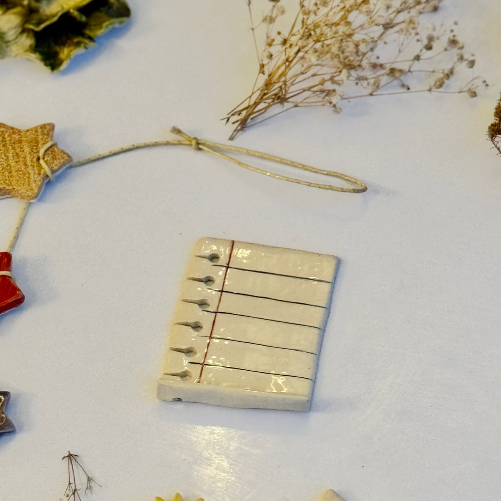Dog-Eared Page Ornaments, close view of the ruled-line detail