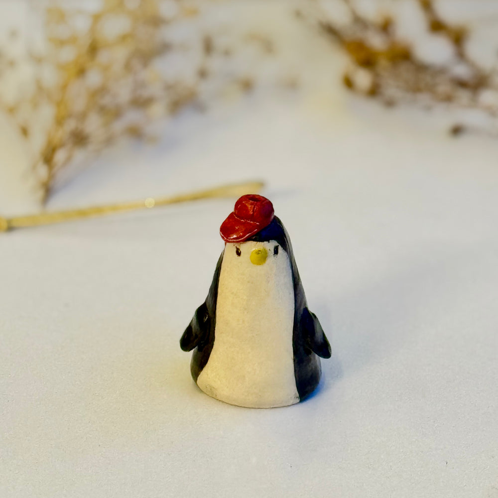 Berry Beanie Penguin, front view in different light