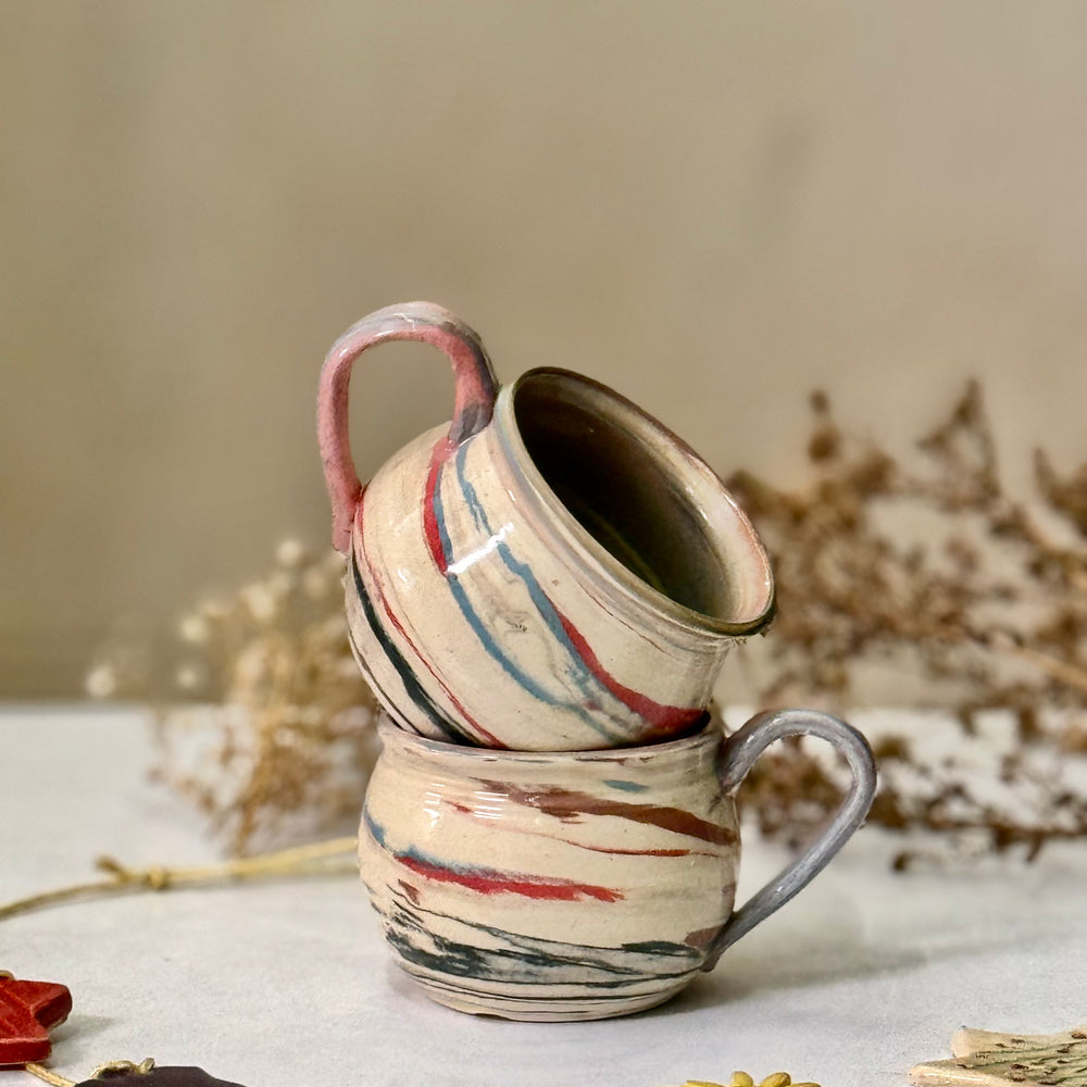 Twilight Marble Mugs, the pair stacked together