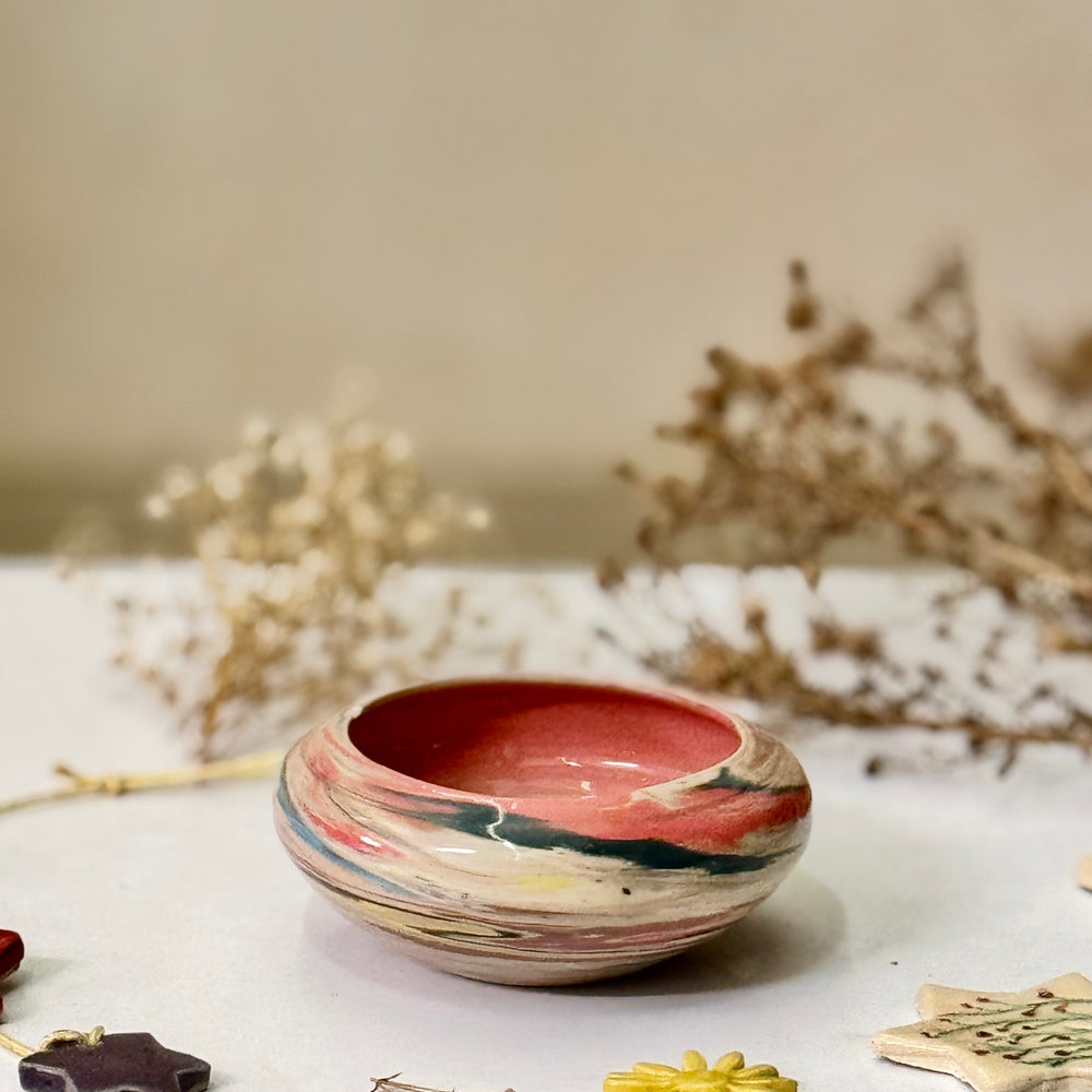Sunset Marble Bowl, interior view showing the marbled glaze