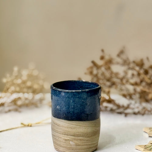Deep Tide Vase, front view showing the navy-to-stoneware glaze