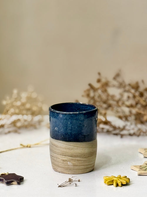 Deep Tide Vase, front view showing the navy-to-stoneware glaze