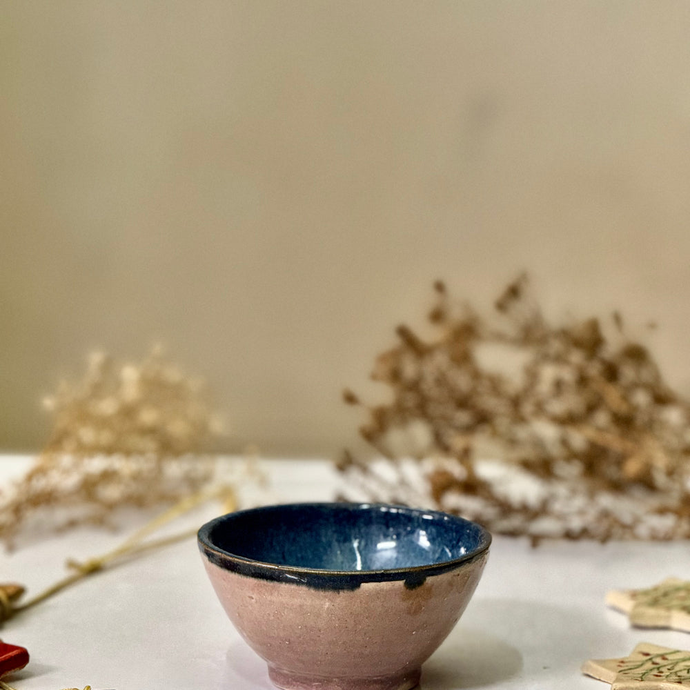 Dawn Glaze Bowl, front view showing the pink exterior